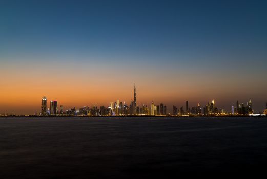 Stunning view of Dubai's skyline at twilight featuring the iconic Burj Khalifa.